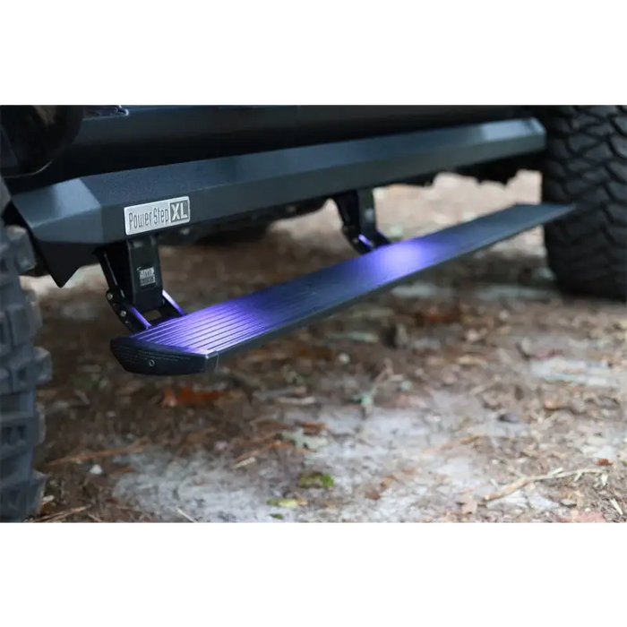 Black Jeep Wrangler JL front bumper plate with blue LED illumination.