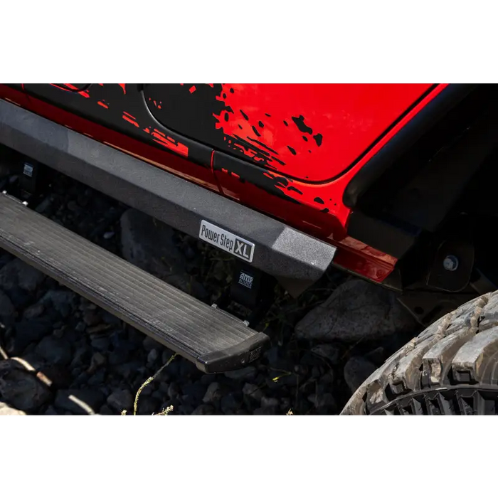 Red Jeep Wrangler JL 2DR front bumper plate close up.