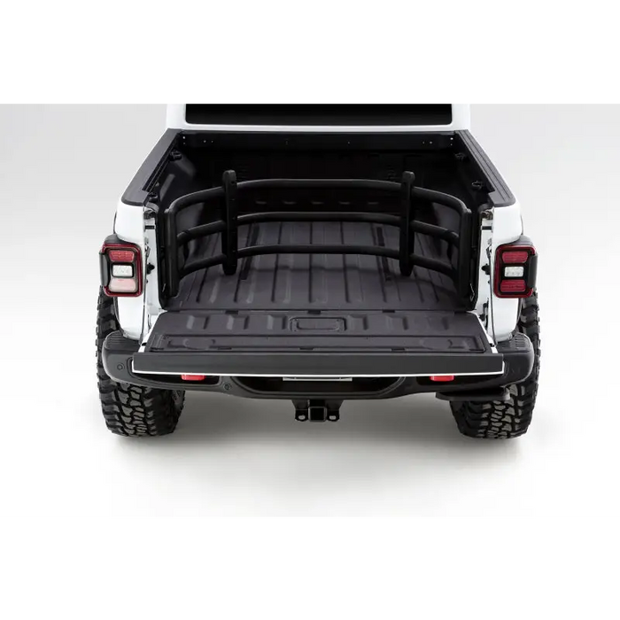 AMP Research 20-22 Jeep Gladiator Bedxtender HD Sport - Black: rear of white jeep with trunk open