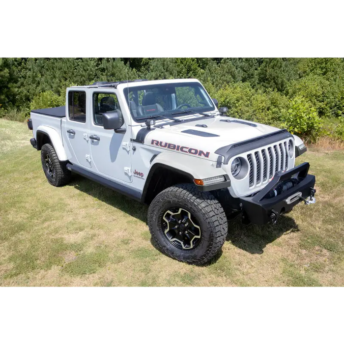 Amp research powerstep XL for Jeep JT Gladiator with black bumper and red/white sticker.