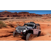 Jeep Wrangler driving through desert - AMP Research PowerStep XL Black
