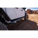 AMP Research PowerStep XL installed on a Jeep JT Gladiator parked on dirt road