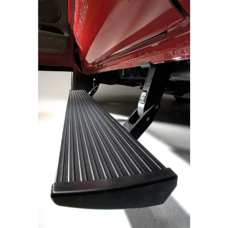 Red truck with black AMP Research PowerStep for 2016-2017 Toyota Tacoma.