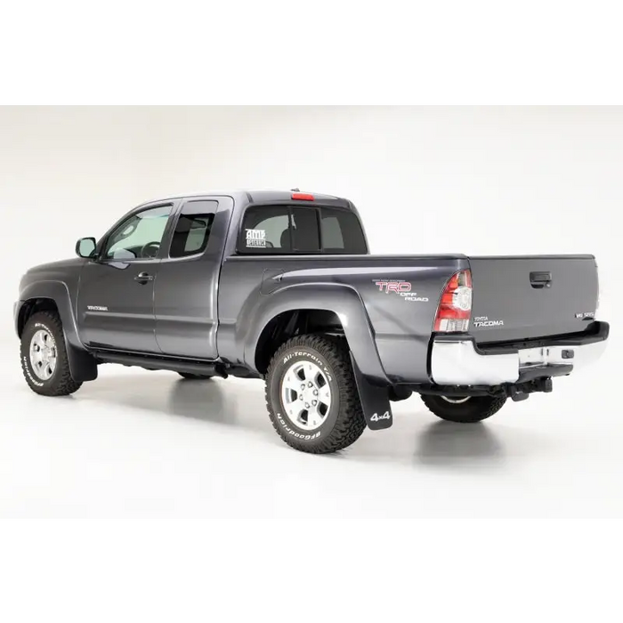 AMP Research 2016-2017 Toyota Tacoma Double Cab/Access PowerStep - Black truck with black bumper on white background