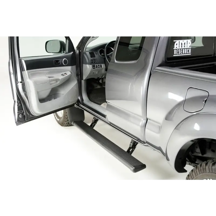 AMP Research 2016-2017 Toyota Tacoma Double Cab/Access PowerStep - Black with open door