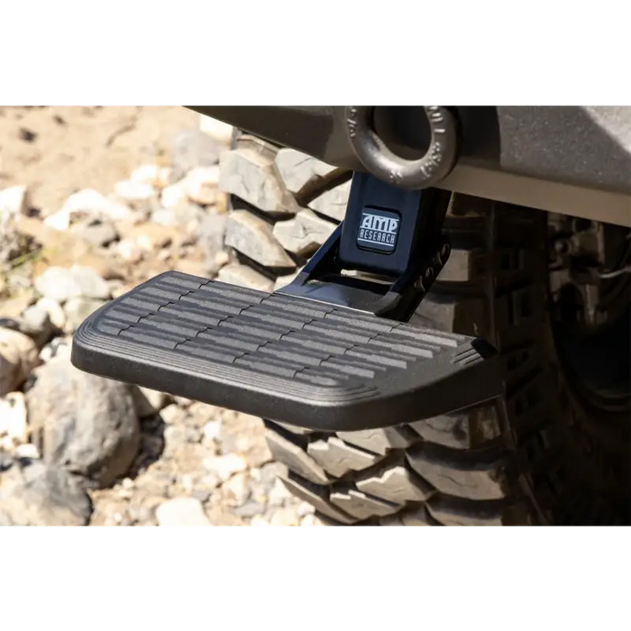 Black plastic pedal for 2018 Jeep Wrangler BedStep with installation instructions