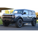 Gray truck parked in front of house - AMP Research Ford Bronco XL PowerStep Black