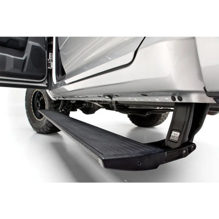 AMP Research Powerstep Plug N Play side steps in black on silver Ford Bronco.