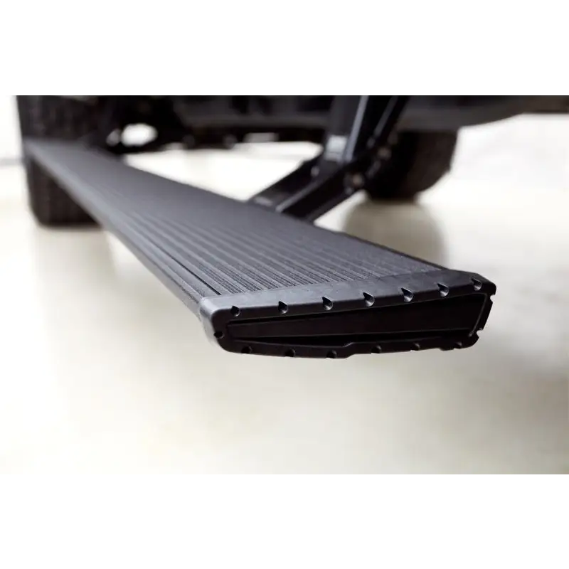 AMP Research PowerStep Xtreme Black truck flat bed close up.