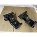 AMP Research PowerStep Idler Linkage - Pair of black plastic brackets for front and rear of a car.