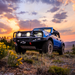 Blue jeep parked on rocky road with arb 2021 ford bronco summit winch bumper