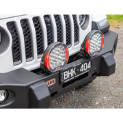 Front bumper light bar mounted on Jeep Wrangler TJ Multi-fit Winch Bumper.