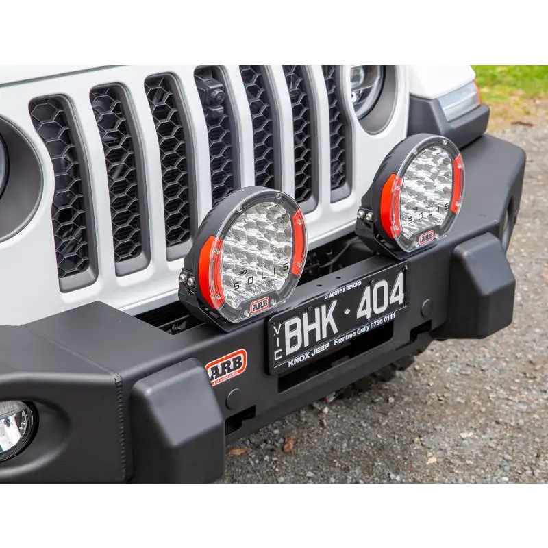 Front bumper light bar mounted on Jeep Wrangler TJ Multi-fit Winch Bumper.