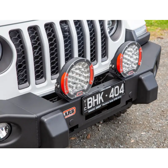 Front bumper light bar mounted on Jeep Wrangler TJ Multi-fit Winch Bumper.