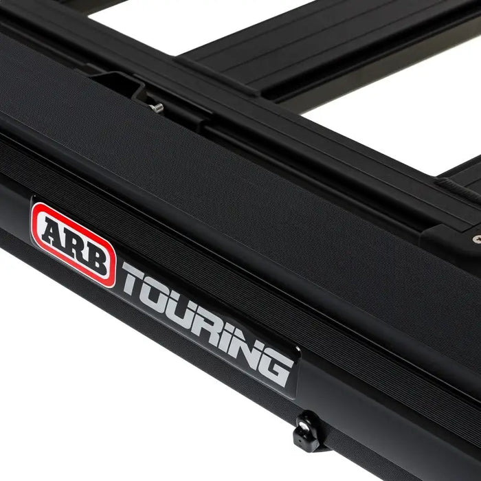 ARB Aluminum Awning Black Frame Logo on Rooftop Rack