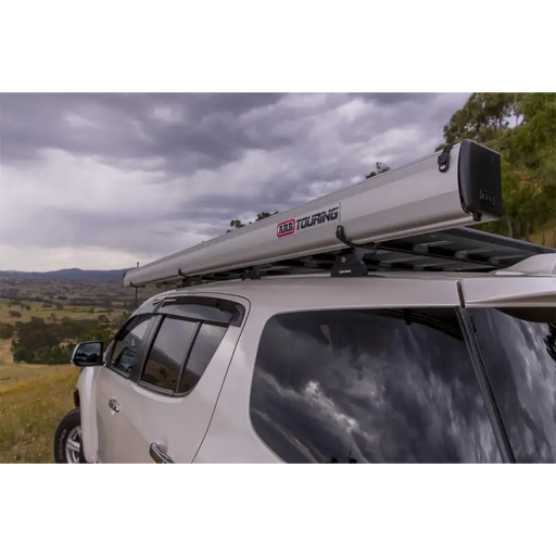 ARB Aluminum Awning Kit with Light Installed on Car Roof Rack