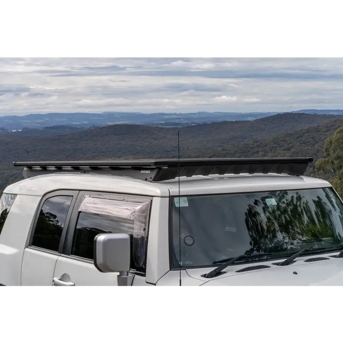 White van with base rack on roof - ARB Base Rack Deflector and Mount Kit