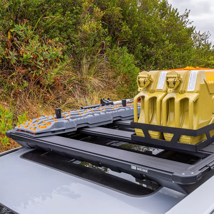 Yellow truck with yellow trailer on top - arb base rack mount kit with deflector