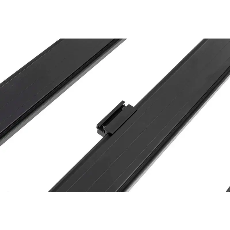Black ARB BASE Rack T-Slot Adaptor side rails for Jeep Wrangler.
