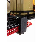 ARB Baserack Hi-Lift Jack Holder with black door handle on side of truck.