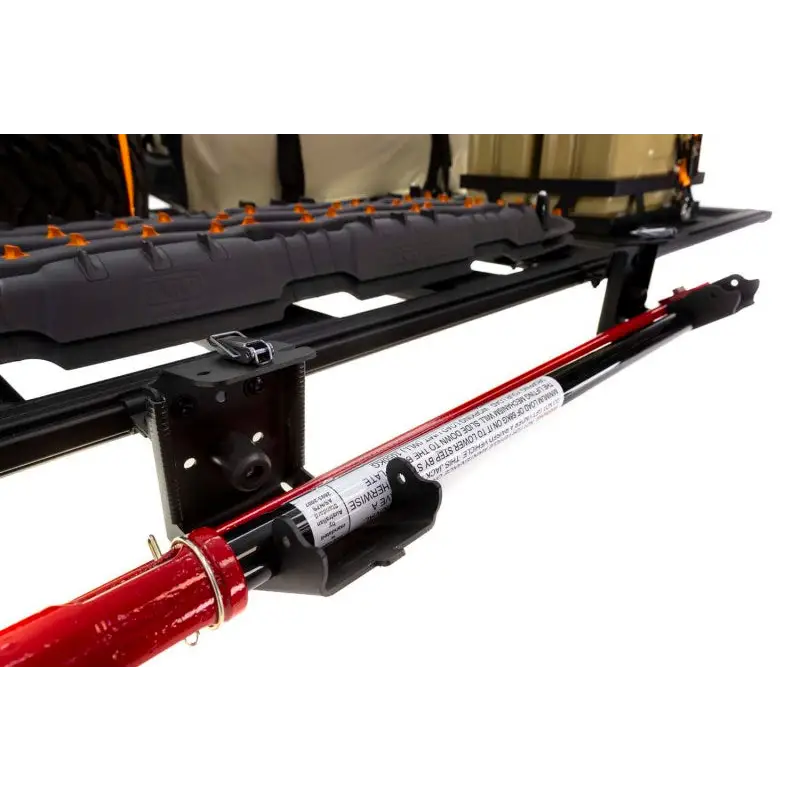 ARB Baserack Hi-Lift Jack Holder attached to Jeep Wrangler dovetail extrusion