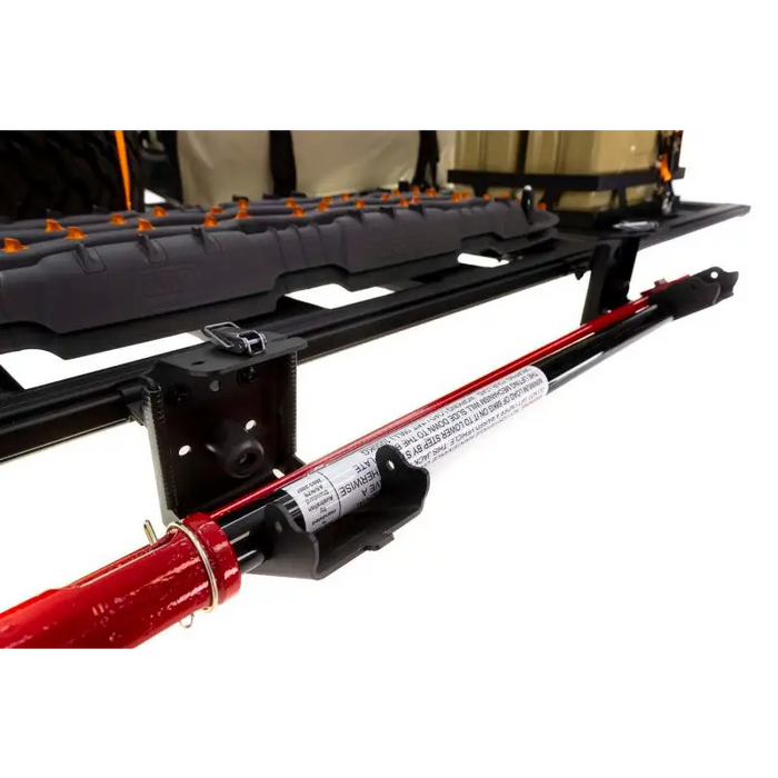 ARB Baserack Hi-Lift Jack Holder attached to Jeep Wrangler dovetail extrusion