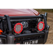 Clear ARB Cover for Jeep Wrangler front bumper light on red truck