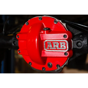 Red ARB Diff Cover Chrysler 8.25In protecting against road hazards.