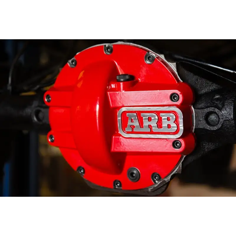 Red ARB Diff Cover Chrysler 8.25In protecting against road hazards.