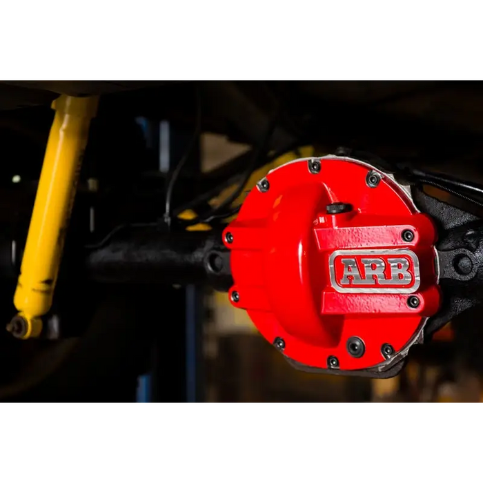 Red brake cover on yellow motorcycle - ARB Diff Cover Chrysler 8.25In helps protect against road hazards.