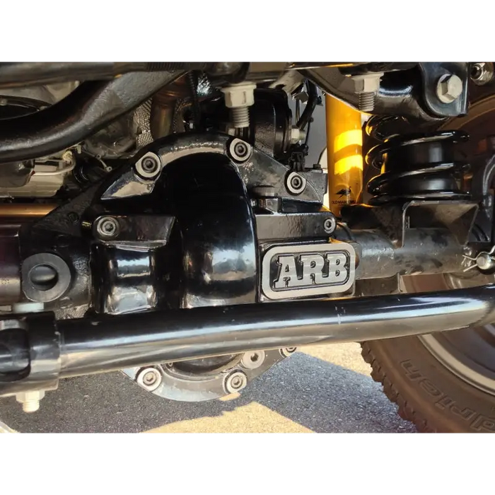 Close-up of the rear end of a motorcycle displayed in ARB Diff Cover D44 Blk.