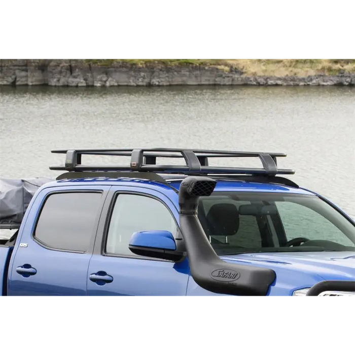 Blue truck with surfboard on roof, ARB F/Kit R/Rack suits Tacoma 16On.