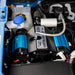 Blue car battery in ARB Ford Bronco Compressor Bracket