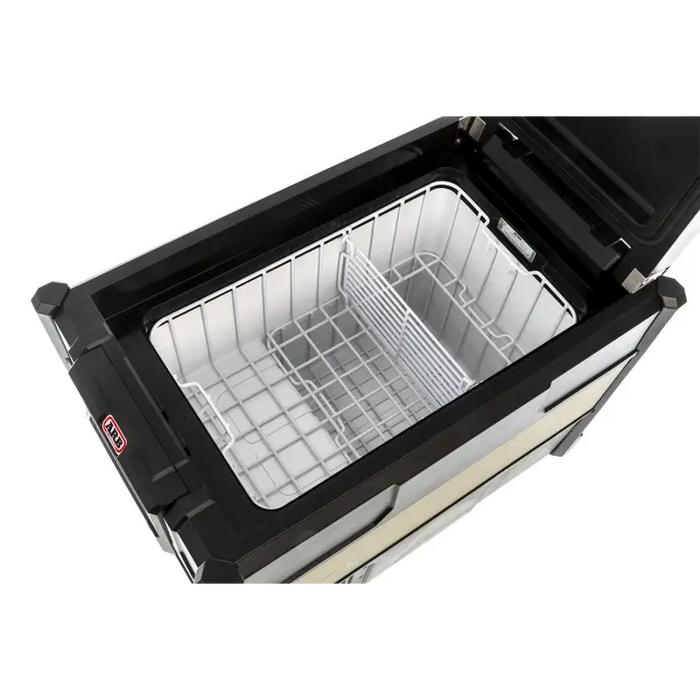 Black and white dishwasher basket inside ARB Fridge 47 Quart Zero B Plug.