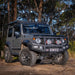 ARB Intensity Solis 21 spotlight jeep parked on dirt road