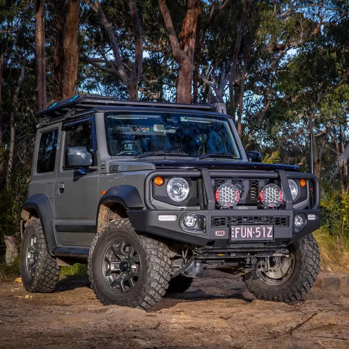 ARB Intensity SOLIS 21 2 Flood Kit With Loom - Jeep parked on dirt road.