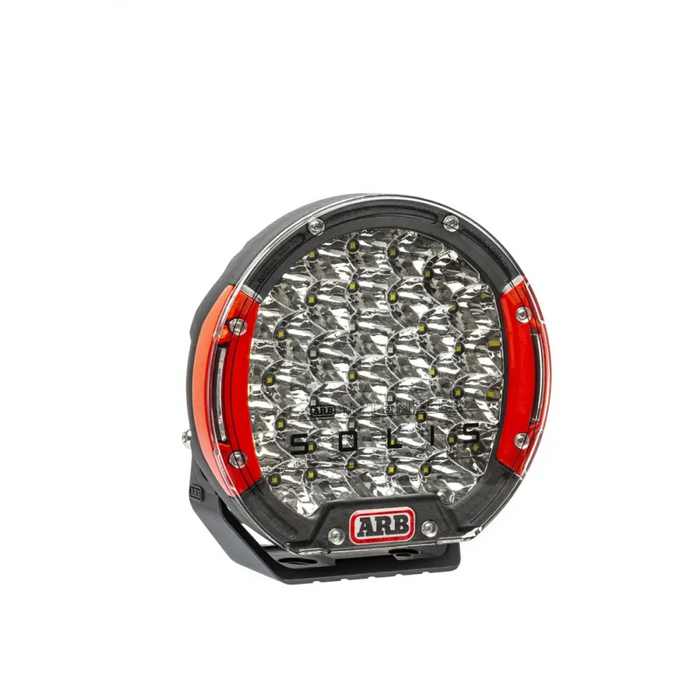 Close up of red and black ARB Intensity SOLIS 36 LED Flood light on white background