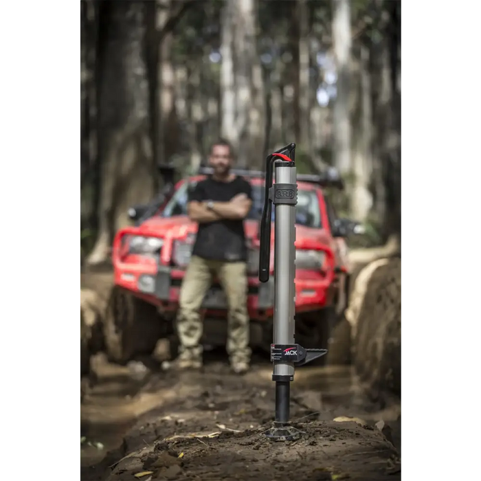 Red farm jack light mounted on pole for ARB Jack, featuring hydraulic technology.