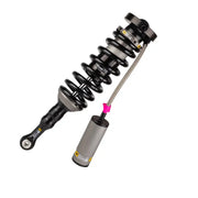 Close up of ARB/Ome BP51 Coilover shock absorber with small tool.