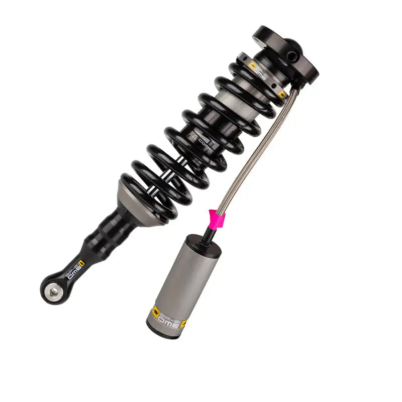 Close up of ARB/Ome BP51 Coilover shock absorber with small tool.