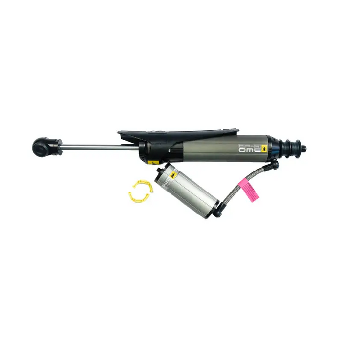 ARB OME BP51 shock absorber with black and yellow paint spray gun