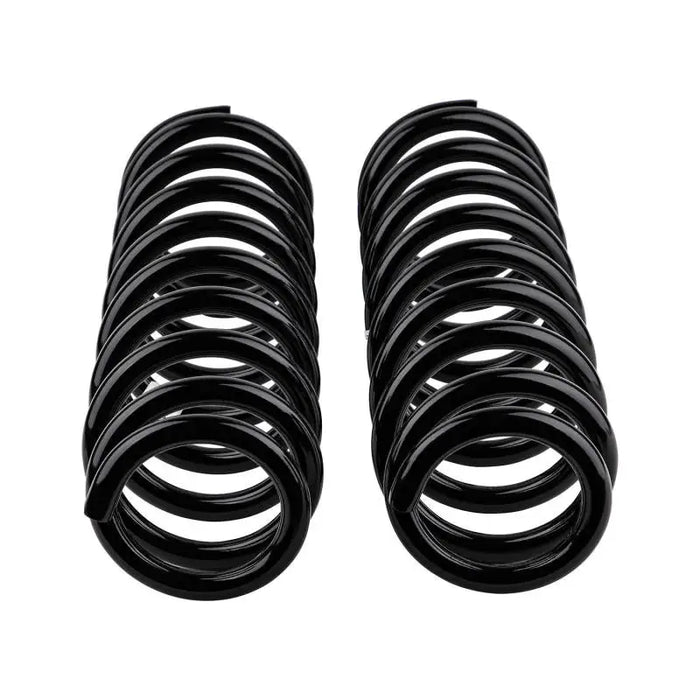 ARB / OME Coil Spring Front 78&79Ser Hd - Black rubber springs for a car