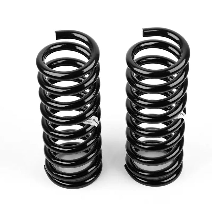 Black ARB / OME coil springs for Jeep Wh Cherokee on white background