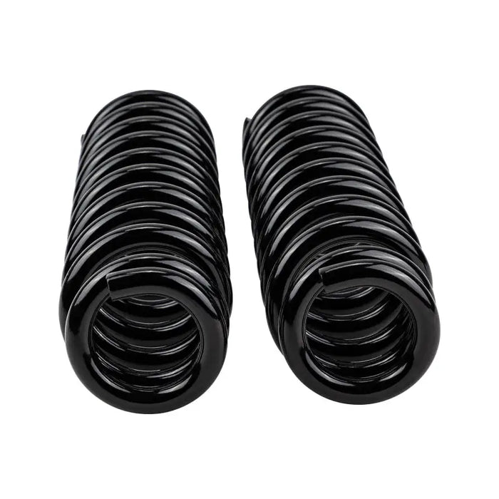 ARB / OME Coil Spring Front Prado 150 - Pair of black OME coil springs for a car on white background