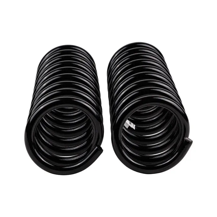 Black rubber OME coil springs for car displayed in ARB product ’OME Coil Spring Wk2’