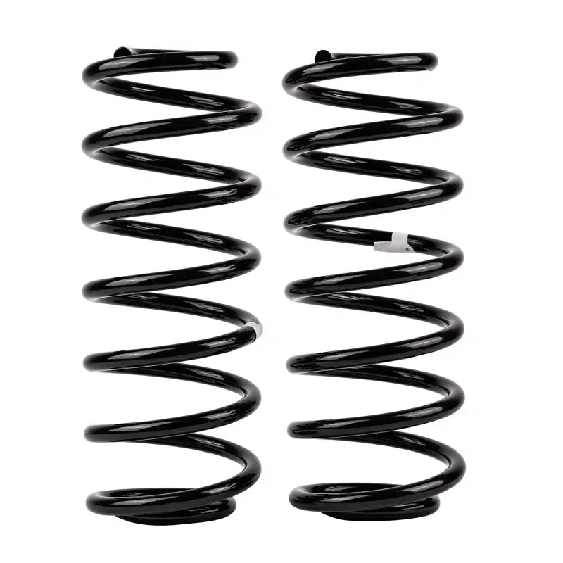 Black ARB / OME coil spring rear Grand WJ MD on white background