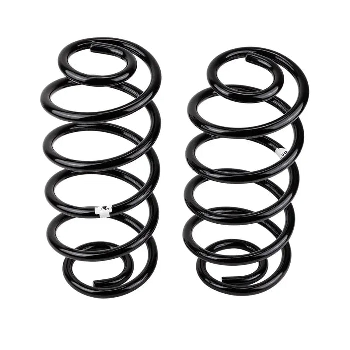 Pair of black OME coil springs for rear suspension on Jeep TJ