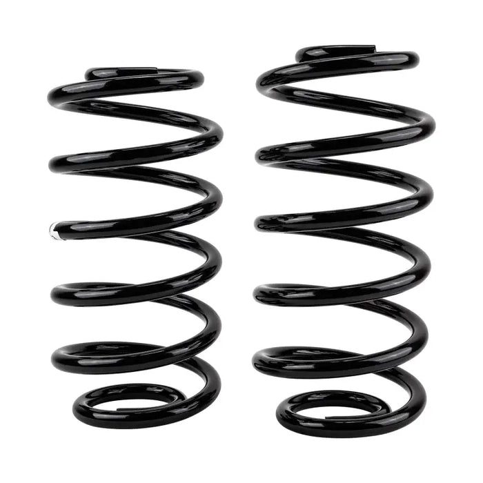 ARB / OME Coil Spring Rear Jeep Tj Unltd: Pair of black springs on white background.