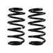 Pair of black OME coil springs on white background, for ARB rear Jeep Cherokee.