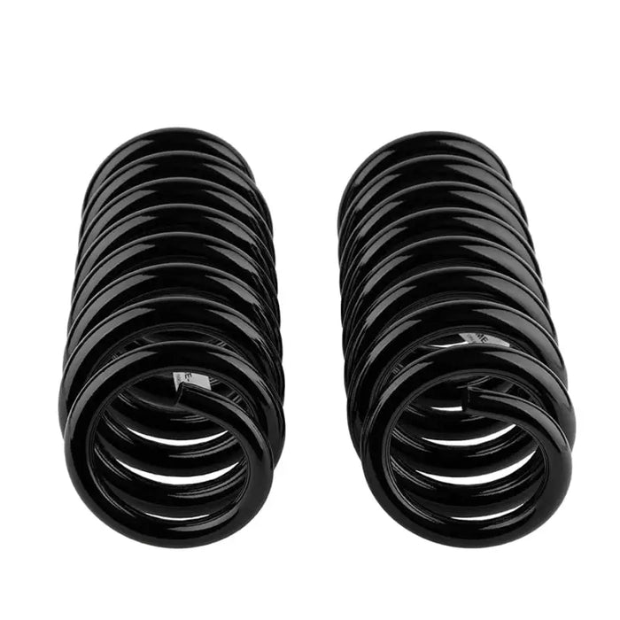 Black rubber front springs for the vehicle by ARB/OME, ome coil spring rear jeep wk2 r.